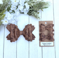 Brown Embossed Bows